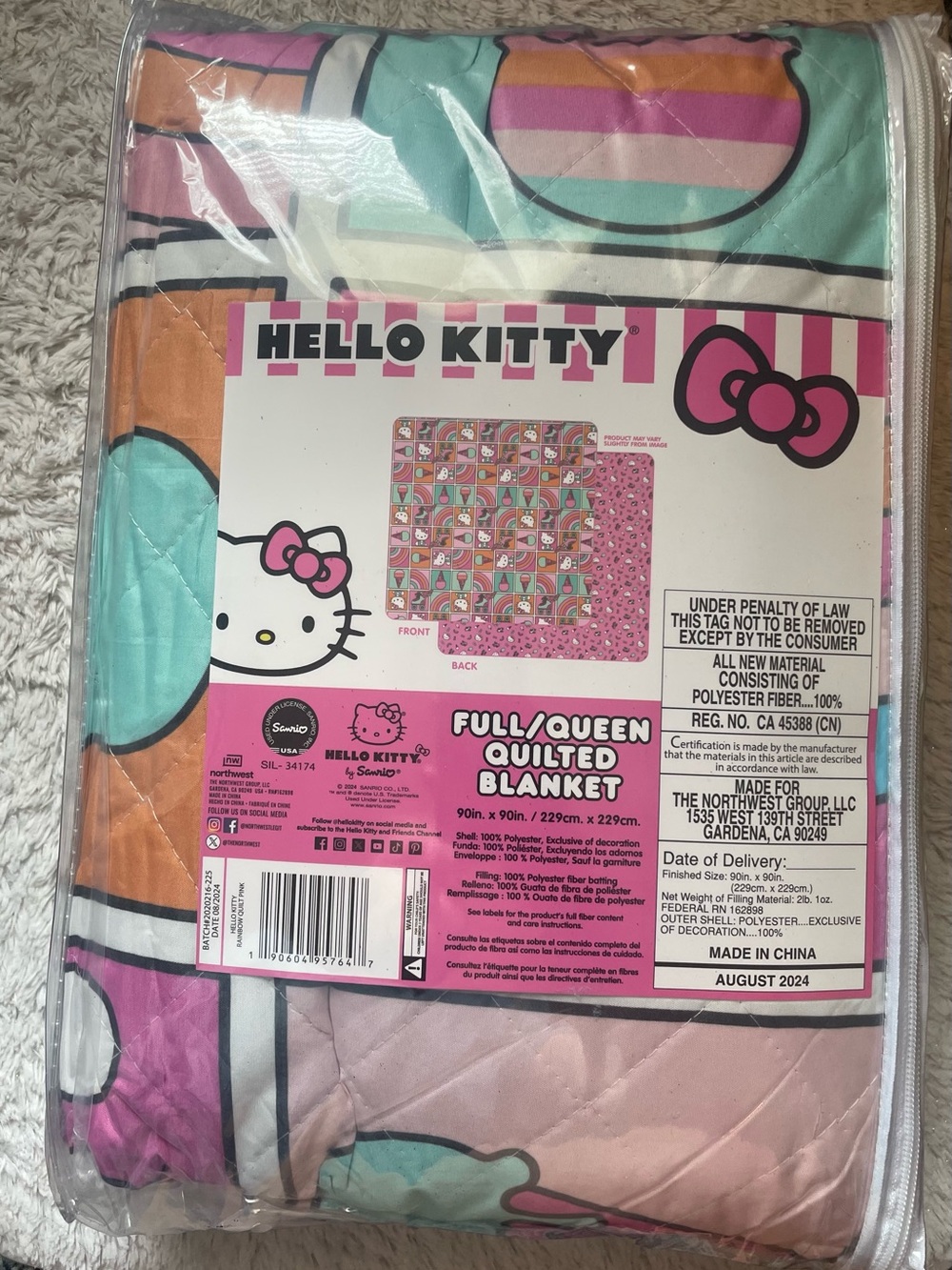 Hello Kitty Quilted Blanket in Pink, Teal & Orange